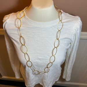 Gold toned oval shaped necklace